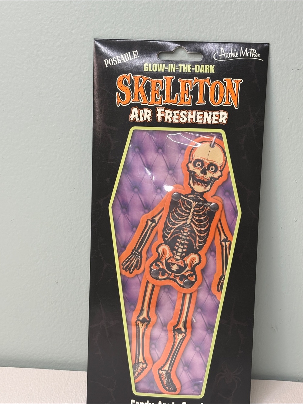 Archie McPhee Glow-in-the-Dark Orange Skeleton Air Freshener